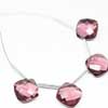 Rhodolite Garnet Quartz (hydro) Faceted Square Beads Strand Quantity 2 Matching Pair (4 Beads) and Size 10x10mm approx. Hydro quartz is synthetic man made quartz. It is created in different different colors and shapes. 